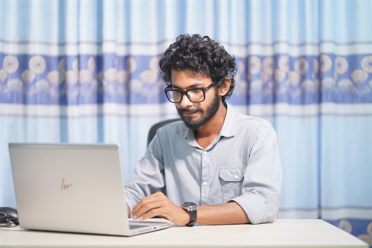 Modern Web Designer Working On Laptop 2026