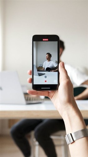 Person Watching Short Form Video On Mobile 2026