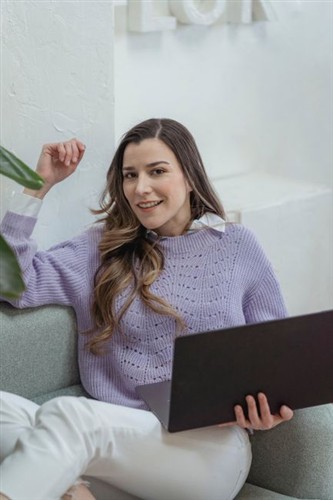 Stylish Blogger Working On Laptop Modern Office 2026