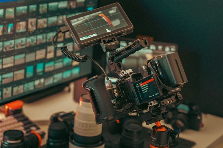 Professional camera and lights in video production studio